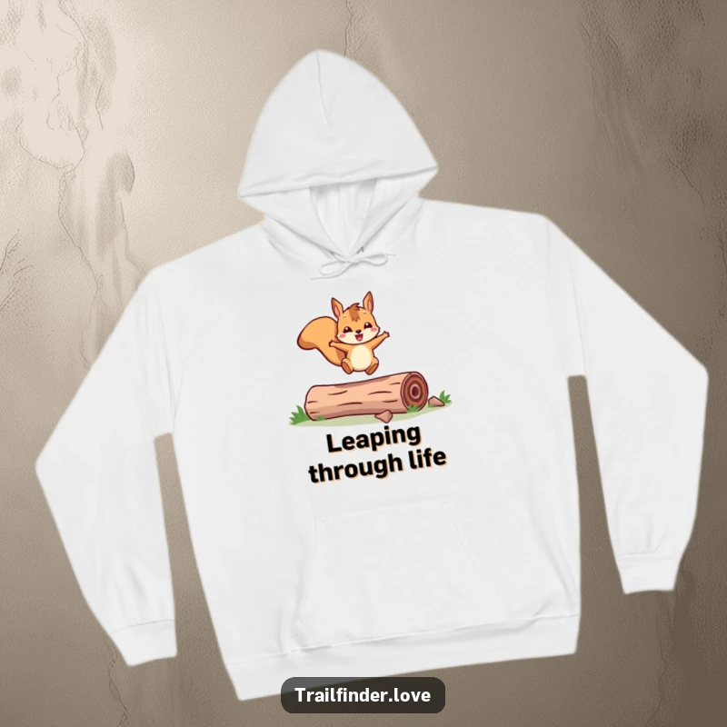 Funny hoodie with a cheerful squirrel character joyfully leaping over a log, offering warmth and a touch of playful outdoor spirit.